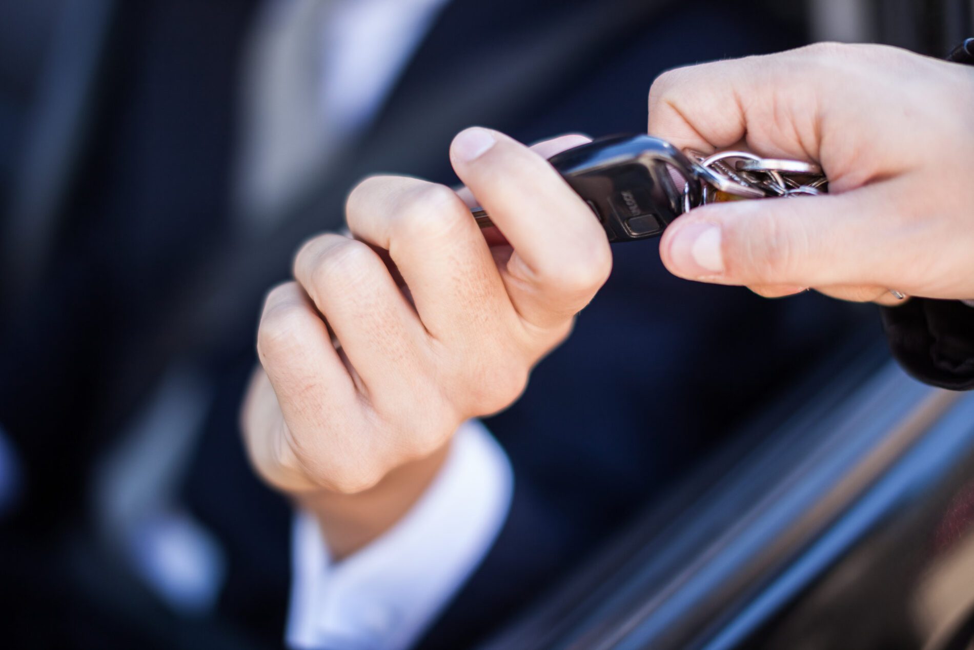 Man taking car key Man taking car key
